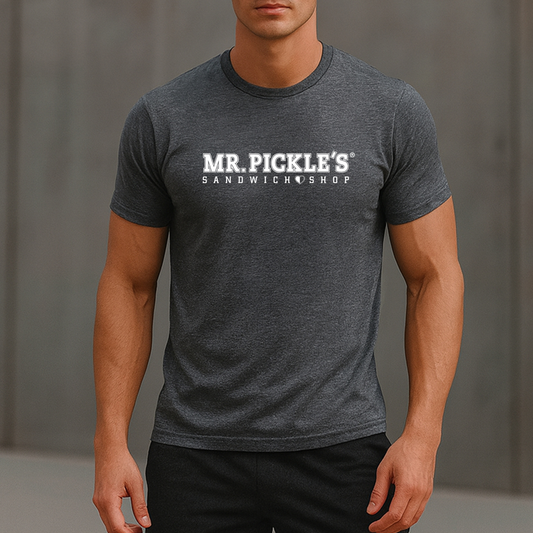 Person wearing a dark gray t-shirt with 'MR. PICKLE'S SANDWICH SHOP' text on a plain background