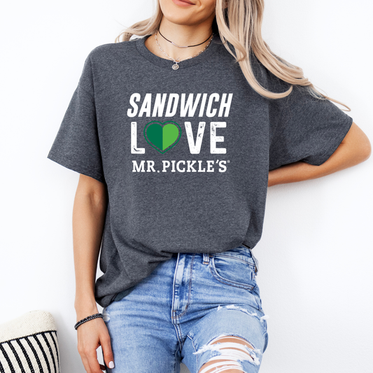 Person wearing a dark gray t-shirt with 'Sandwich Love Mr. Pickle's' text and a green heart on a white background