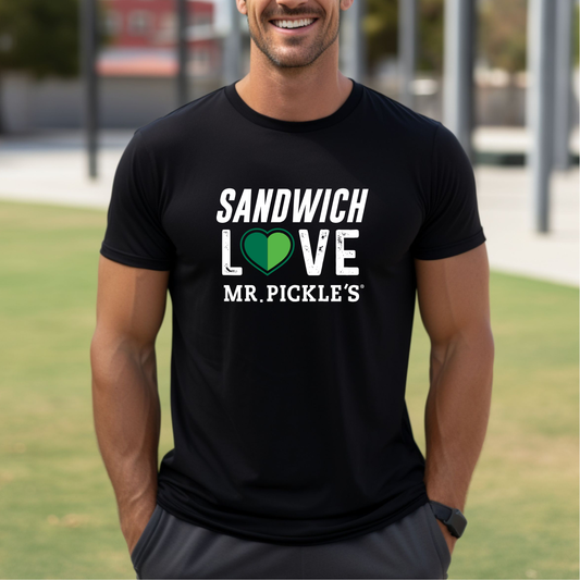 Man wearing a black t-shirt with 'Sandwich Love Mr. Pickle's' text and logo outdoors.
