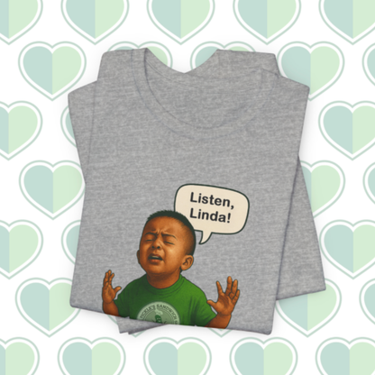Gray tank top with a graphic of a child and 'Listen, Linda!' text on a heart-patterned background