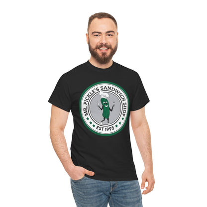 Man wearing a black t-shirt with a green and white logo on a white background
