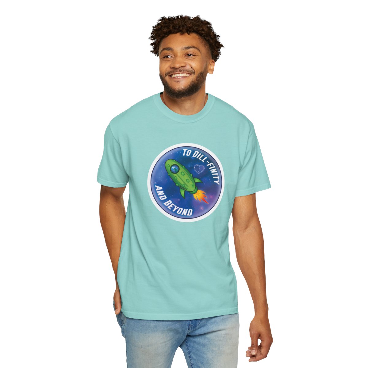 Man wearing a light blue t-shirt with a graphic design on a white background