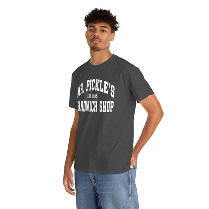 Person wearing a dark gray t-shirt with 'Mr. Pickle's Sandwich Shop' text on a white background