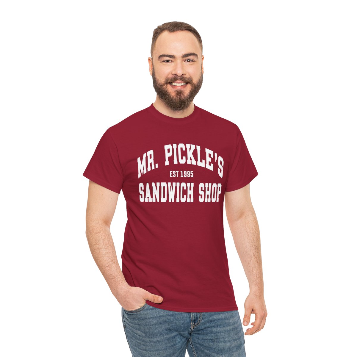 Man wearing a red t-shirt with 'Mr. Pickle's Sandwich Shop' text on a white background