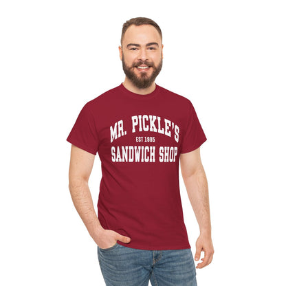 Man wearing a red t-shirt with 'Mr. Pickle's Sandwich Shop' text on a white background