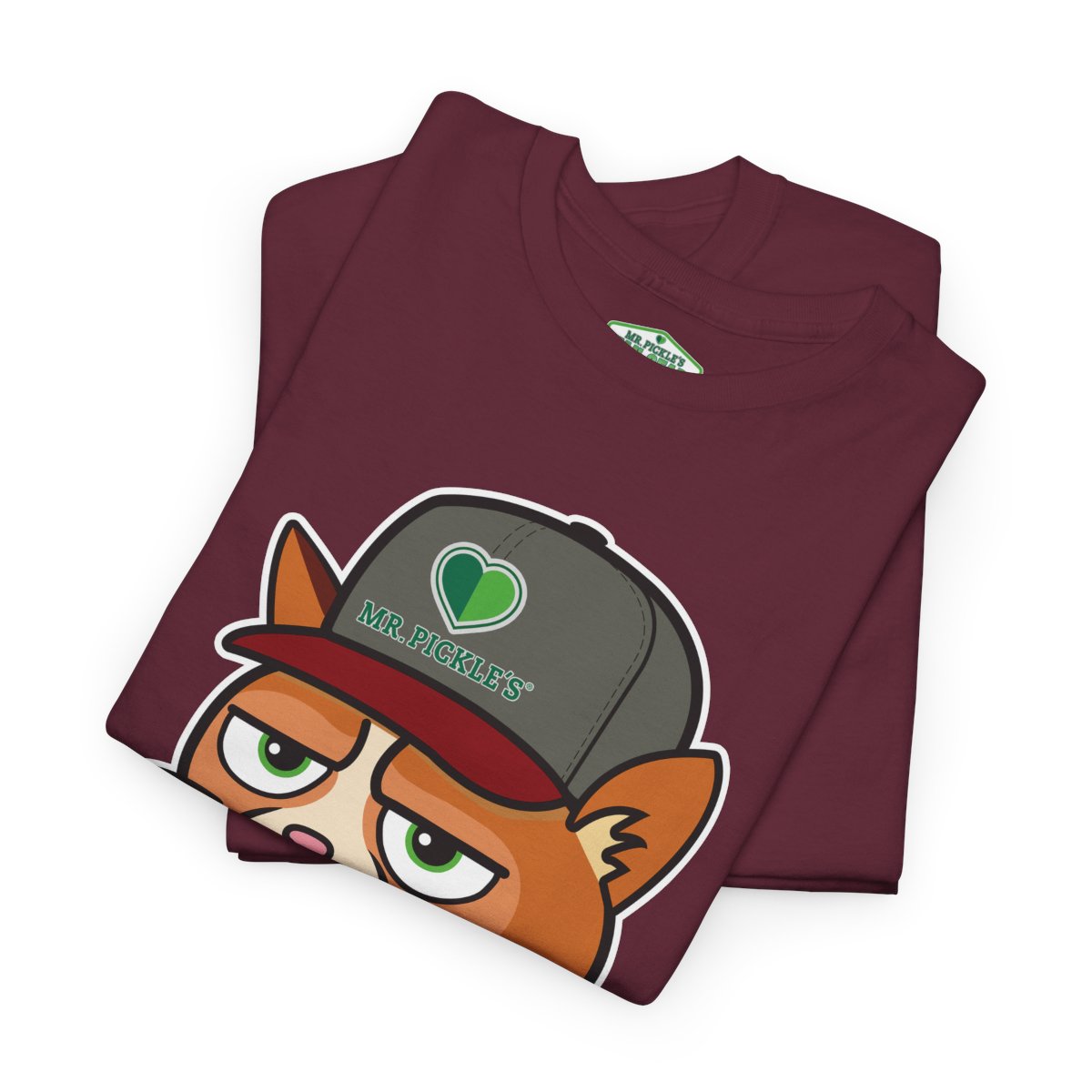 Folded maroon t-shirt with cartoon character and 'Mr. Pickles' text on a white background